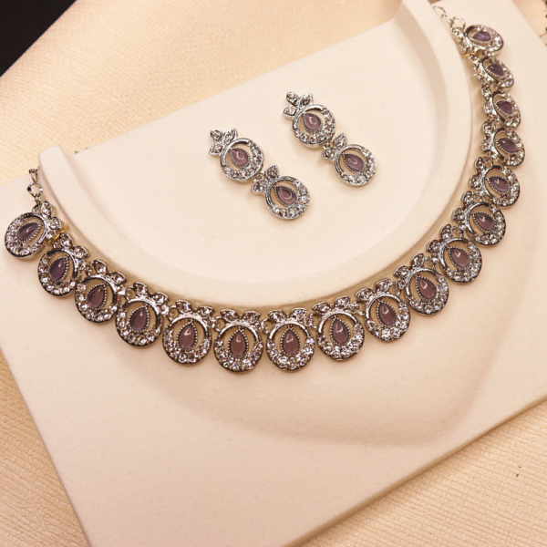 Elegant Teardrop and Purple Stone Design Necklace and Earring Set